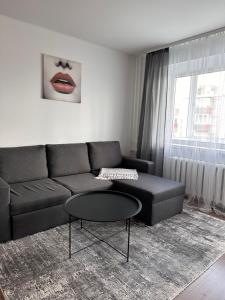 Posezení v ubytování "Aš Centre" apartamentai