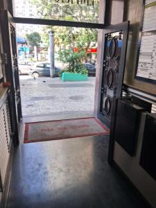 an open door of a building with a street at Coração do Rio de Janeiro in Rio de Janeiro