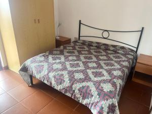 Una cama o camas en una habitación de Borgo Spiaggia 8 letti Vista Mare