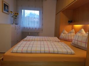 Postel nebo postele na pokoji v ubytování Sonnenblume + 3 fotografie