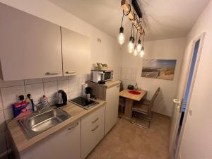 Η κουζίνα ή μικρή κουζίνα στο Apartment 3 ABG69 - ideal für Familien und Geschäftsreisende