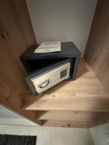 a radio sitting on top of a wooden floor at Danube Island Apartment 3 in Vienna