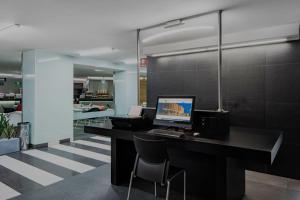 an office with a desk with a computer on it at City Express by Marriott Ciudad de México Alameda in Mexico City