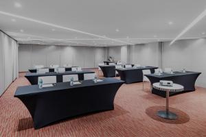 a large room with tables and chairs in it at City Express by Marriott Ciudad de México Alameda in Mexico City