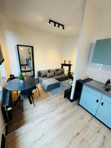 Ruang duduk di Appartement Cosy Liège Station