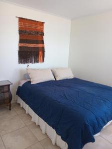 Кровать или кровати в номере Pura vida, estilo Guest House NO departamento completo se arrienda por habitaciones
