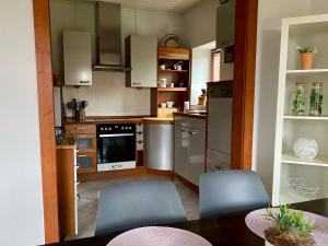 Kuchyň nebo kuchyňský kout v ubytování Schöne Ferienwohnung