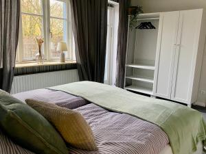 Postel nebo postele na pokoji v ubytování Schöne Ferienwohnung + 8 fotografií