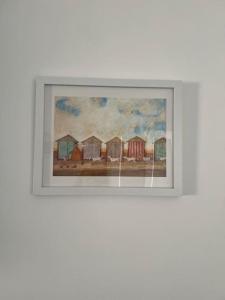 a picture of a painting of a row of houses at Annie's Hideaway in Chapel Saint Leonards