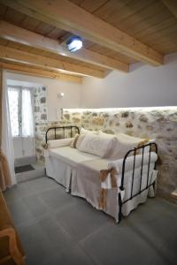 Ένα ή περισσότερα κρεβάτια σε δωμάτιο στο Elena's Island House
