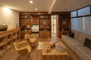 Un lugar para sentarse en Casa Ann Loft Marakame