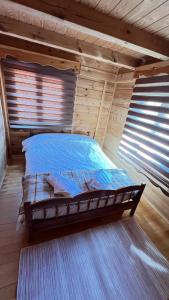 Una cama o camas en una habitación de Çat Hause Mountain