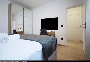 Voodi või voodid majutusasutuse Val De Laco studio apartments toas
