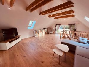 TV a/nebo společenská místnost v ubytování Ferienhaus Garz