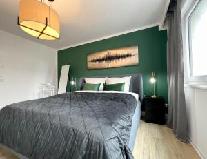 Ένα ή περισσότερα κρεβάτια σε δωμάτιο στο Luxury 3 Room Chemnitz +12 φωτογραφίες