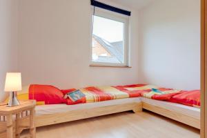 Katil atau katil-katil dalam bilik di Haus Münster in Wohlenberg - 250 Meter zum Strand