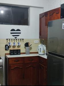 Kuchyň nebo kuchyňský kout v ubytování Departamento en Pimentel + 3 fotografie