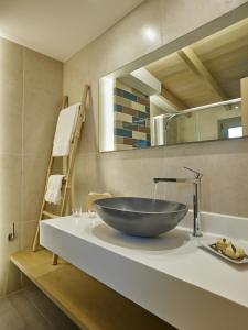 Ванная комната в CICADA HOTEL