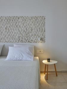 Кровать или кровати в номере CICADA HOTEL