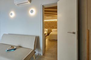 Кровать или кровати в номере CICADA HOTEL