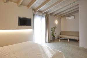 Кровать или кровати в номере CICADA HOTEL