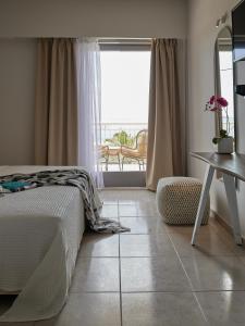 Кровать или кровати в номере CICADA HOTEL