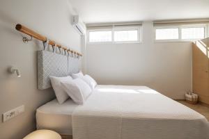 Кровать или кровати в номере CICADA HOTEL