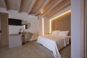 Кровать или кровати в номере CICADA HOTEL