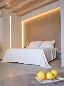 Кровать или кровати в номере CICADA HOTEL