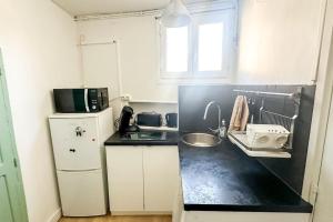 A cozinha ou cozinha compacta de Le Soft Spot - hyper centre Nogent-sur-Marne