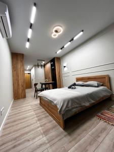 Кровать или кровати в номере Modern Apartment