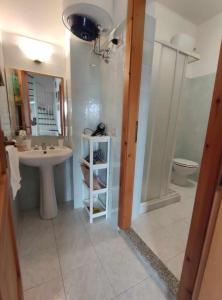 Et badeværelse på Holiday home Riccio di Mare Sardinia