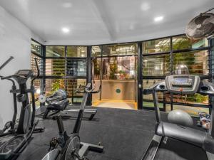 a gym with two exercise bikes in a room at Inner-City Brisbane 1-Bed with Pool Gym & Parking in Brisbane