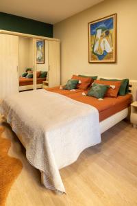 Кровать или кровати в номере ArtE Vitosha Blvd
