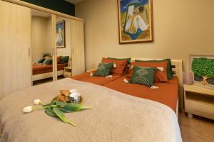 a bedroom with two beds with stuffed animals on them at ArtE Vitosha Blvd in Sofia