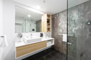 Koupelna v ubytování Avenue Hotel Canberra + 33 fotografií