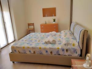Кровать или кровати в номере Casa Vacanze da Giovanna