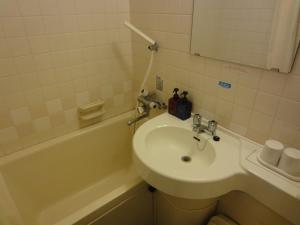 Phòng tắm tại Hotel Ermou Regency