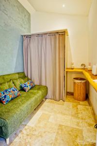 Posezení v ubytování Appart T2 - Jacuzzi gonflable et accès plage