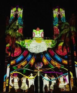 a carnival ride is lit up at night at Chan Kiin Departamentos in Valladolid +38 photos