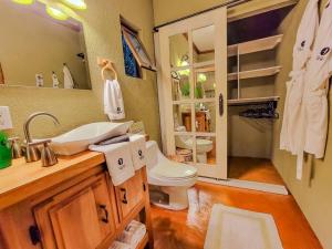 O baie la Vive Utila - Bed & Breakfast