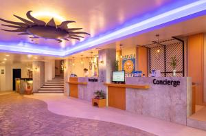 a lobby of a hotel with a counter at Le Soleil de Boracay Hotel in Boracay +43 photos