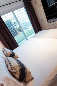 Llit o llits en una habitació de SLB Apart - Duplex