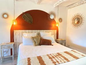 מיטה או מיטות בחדר ב-Le Mas de San Lou