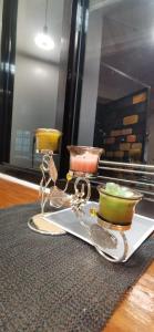 a tray with bowls and utensils on a table at Cool Breeze Lodge and Cafe in Banaue +30 photos