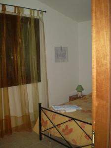 Postel nebo postele na pokoji v ubytování Agriturismo Ternova
