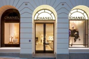 three arched windows on a building with a chanel store at A Chic & Comfy 2BR Apt Near Federation Square in Melbourne