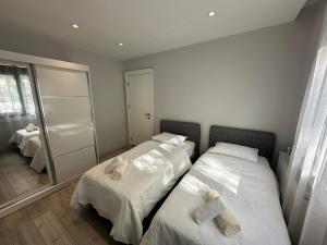 En eller flere senge i et værelse på Beautiful Apartment in Center Antalya