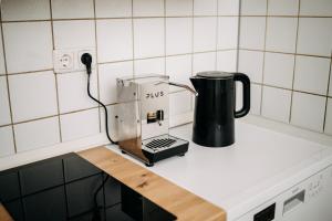 a coffee maker on a counter in a kitchen at Fewo-Rathaus in Kempten