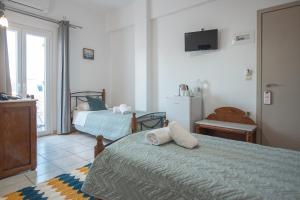Letto o letti in una camera di Pension Stella